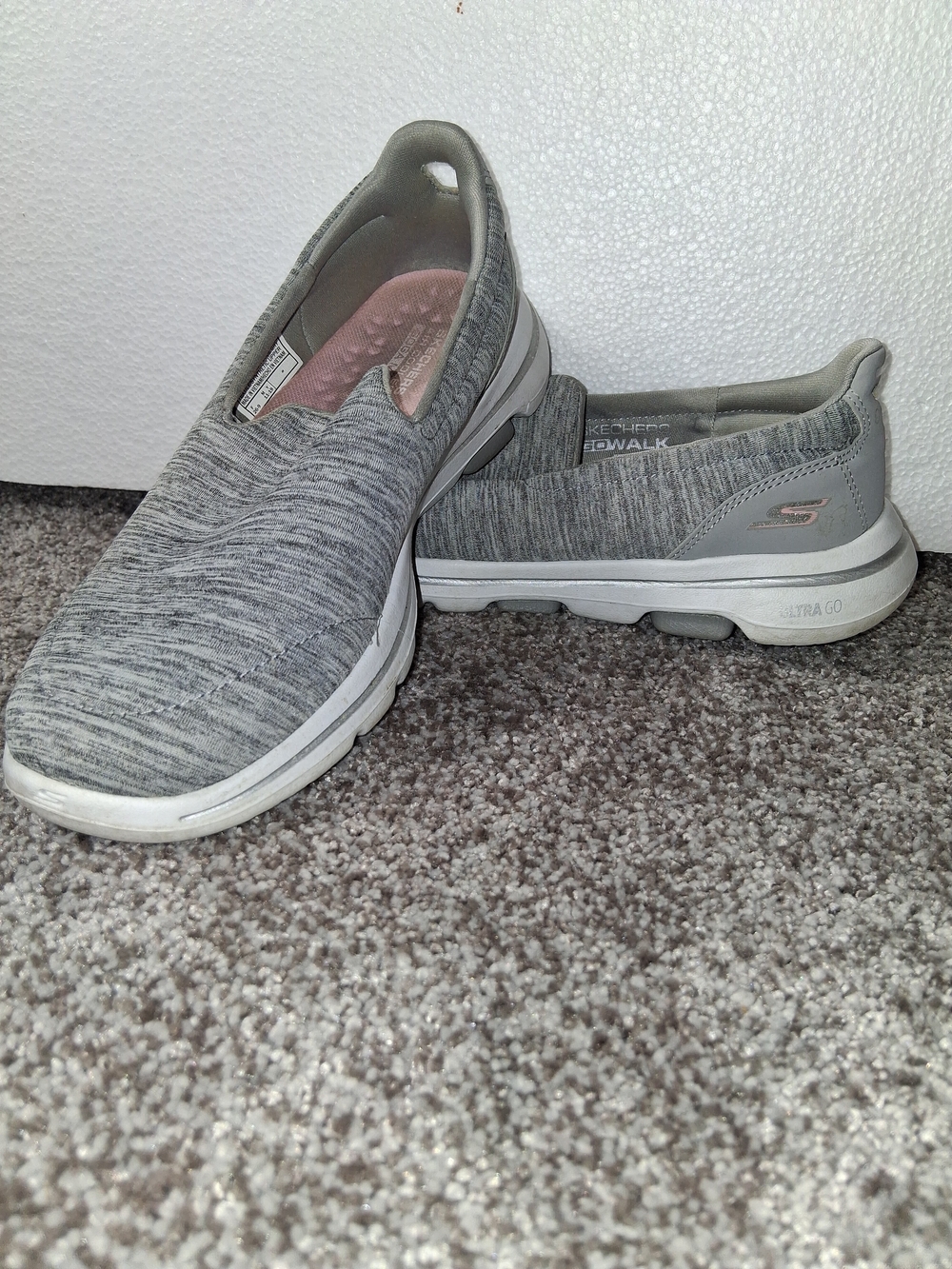 Skechers Women's GO Walk 5 Honor slip-on sneakers in a grey heathered fabric.